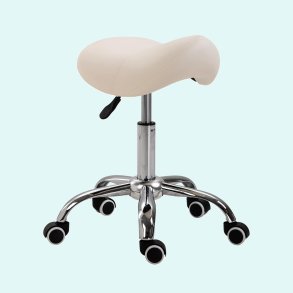 Rotating chair with saddle seat